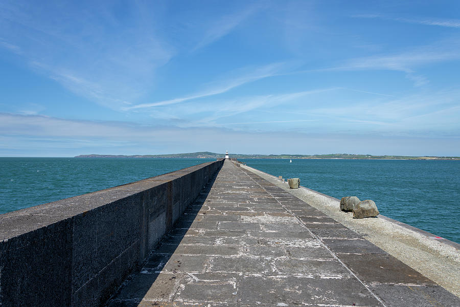 Holyhead breakwater and lighthouse Photograph by Steev Stamford