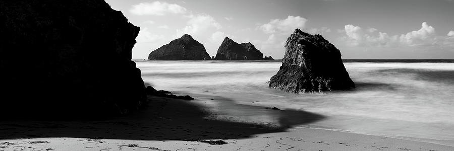 Holywell Beach and Gull Rock Cornwall Coast black and white Photograph by Sonny Ryse