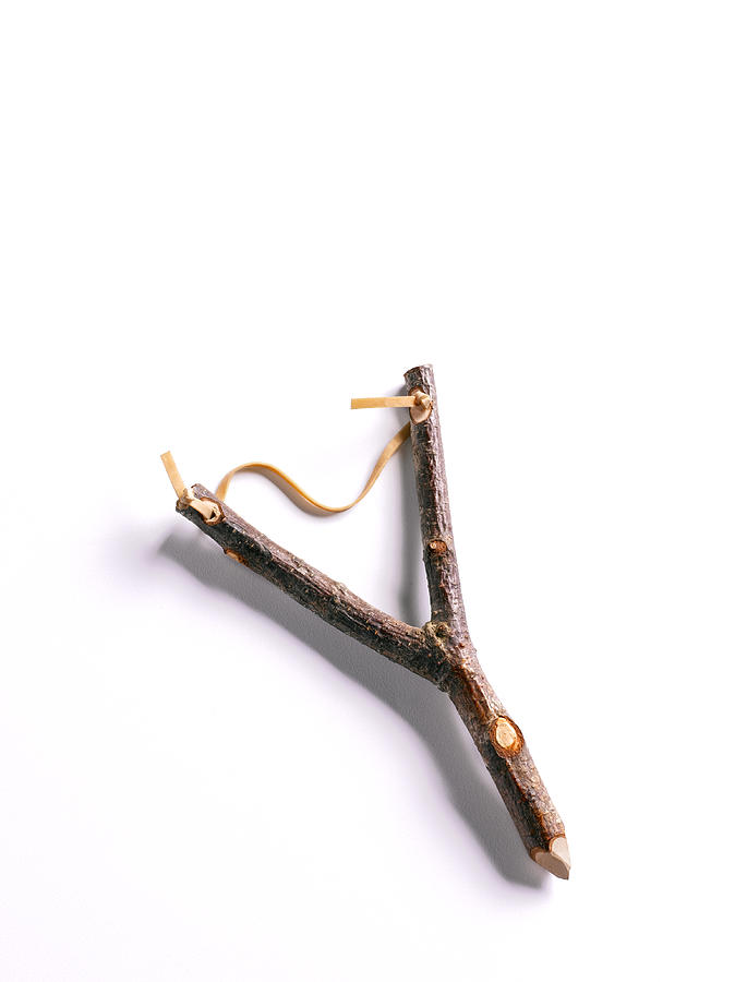 Home made wooden Catapult on white background Photograph by Peter Dazeley