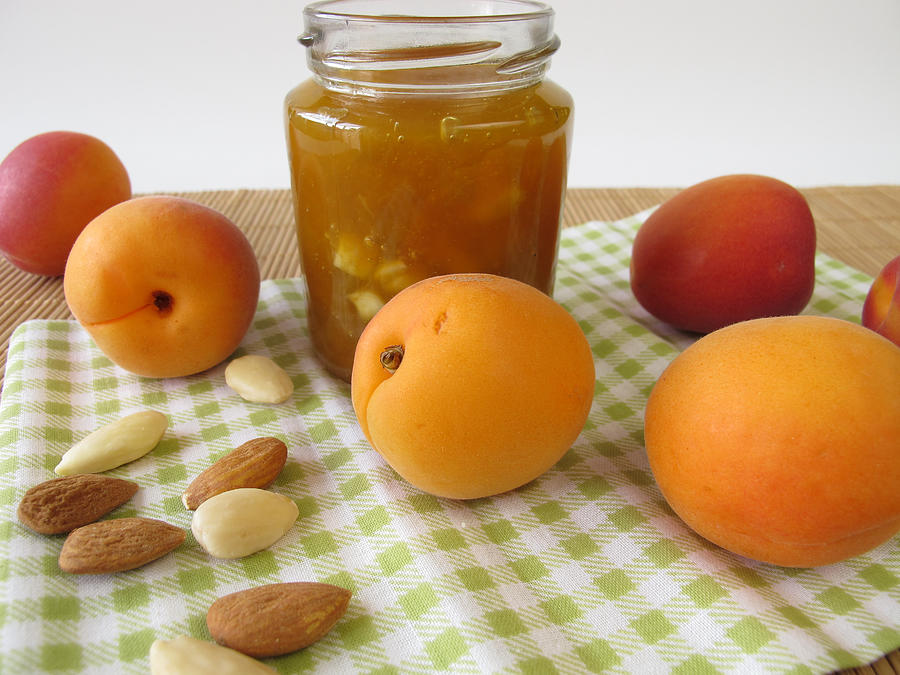 Homemade apricot jam with almonds Photograph by HeikeRau