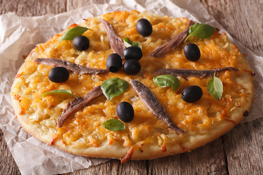 Homemade French pizza Pissaladiere with anchovy fillets  close-up Photograph by Alleko