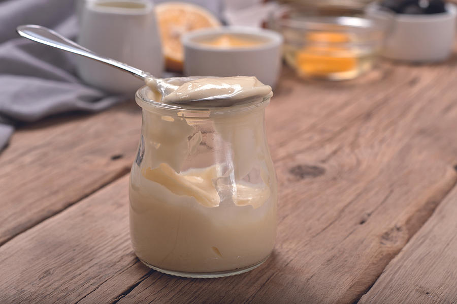 Homemade mayonnaise in glass jar Photograph by KucherAV