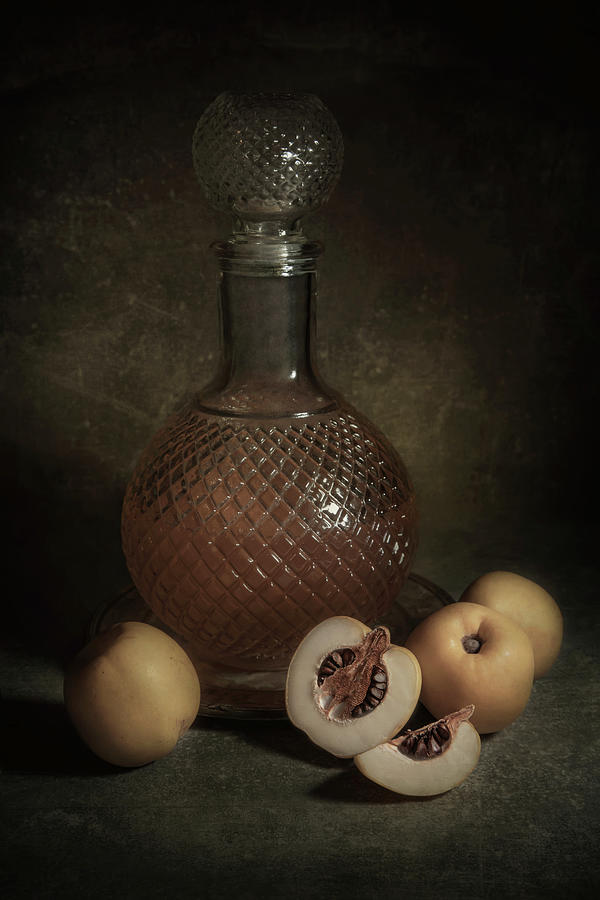 Homemade Quince Liqueur Photograph by Jaroslaw Blaminsky
