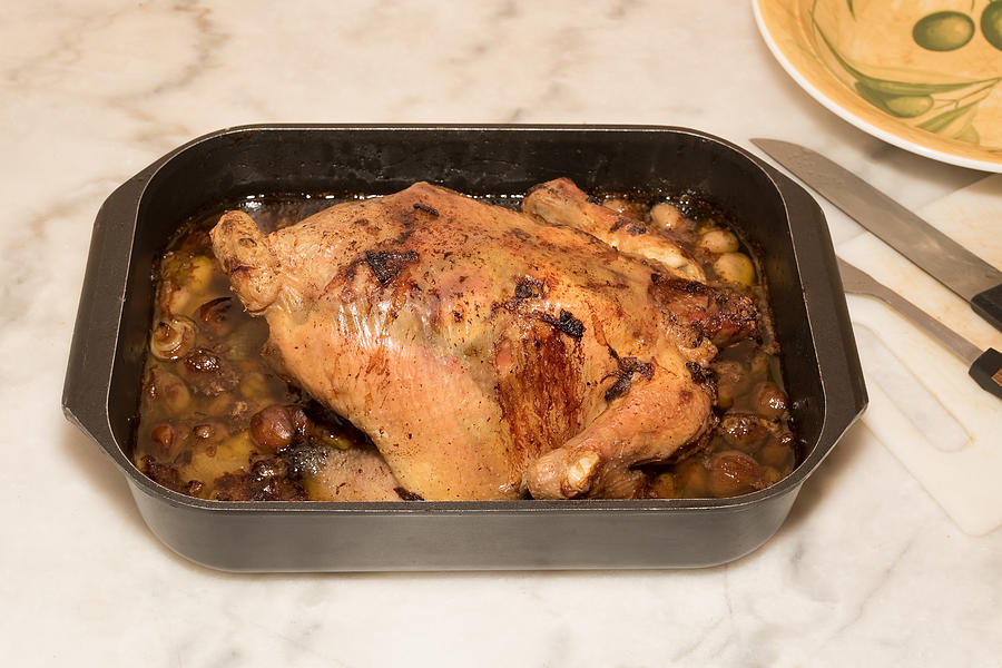 Homemade roast whole chicken in one dish Photograph by Jean-Marc PAYET