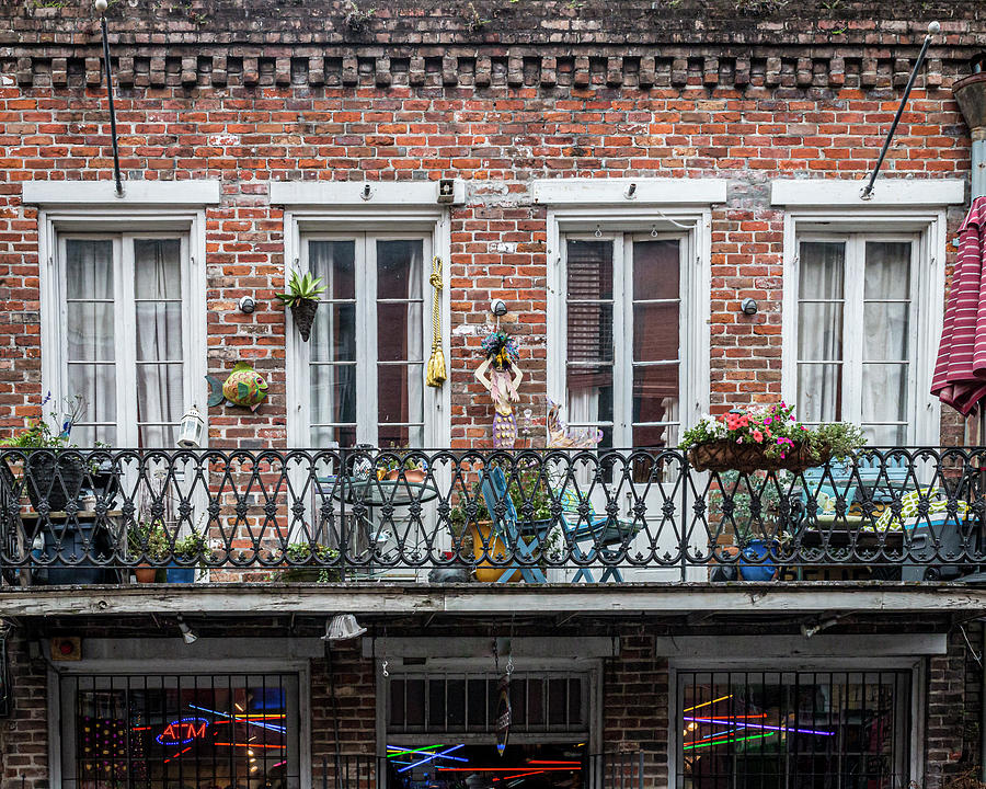 Homey Balcony Over a Pub Photograph by Patti Deters