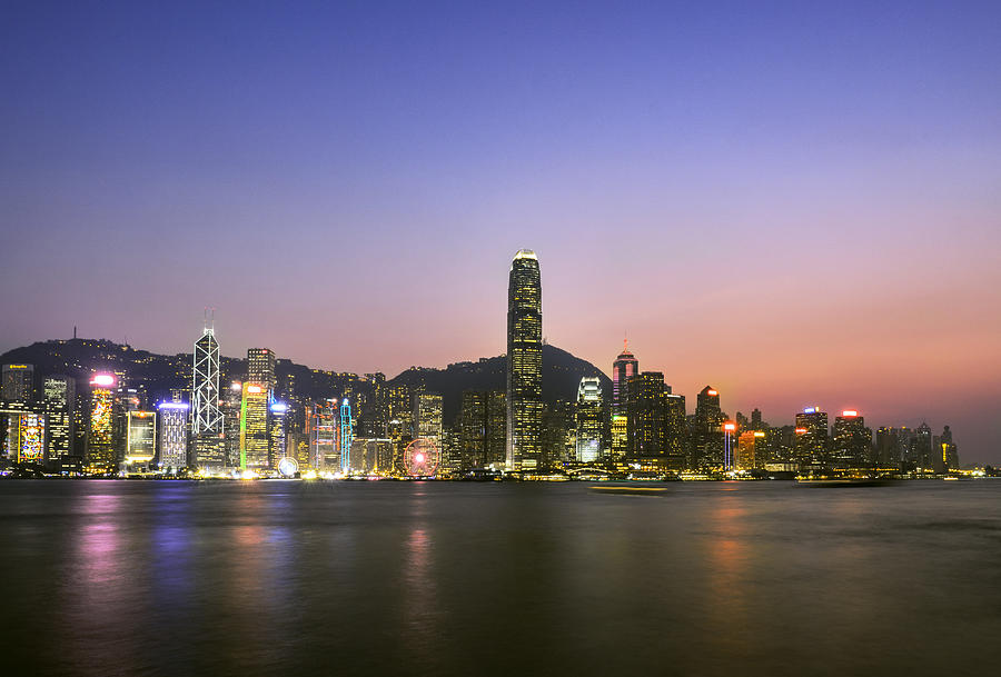 Hong Kong Skyline at dusk Photograph by Bernd Schunack