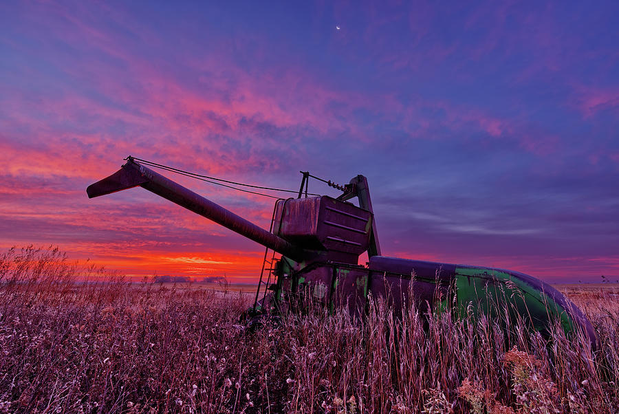 Hoping for Another Harvest - vintage John Deere combine before a ND sunrise  Photograph by Peter Herman