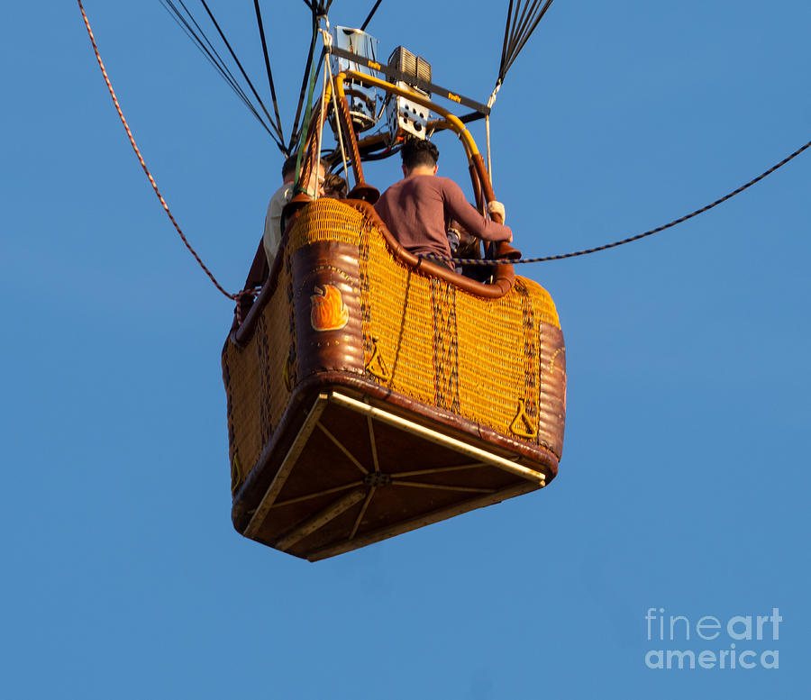 Hot Air Balloon Basket Against a Bright Blue Sky Photograph by L Bosco