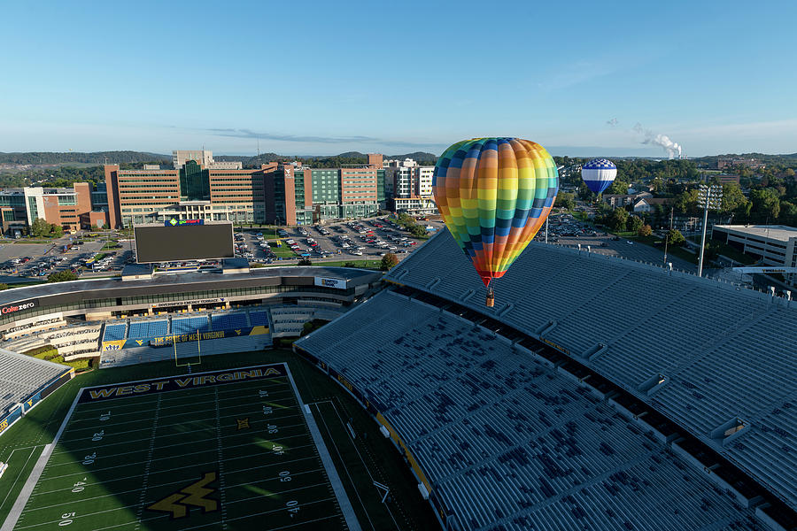 Hot air balloon coming into the stadium Photograph by Dan Friend