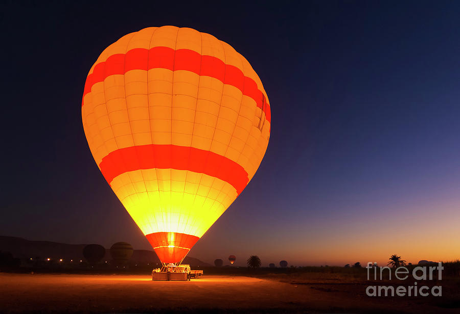 Hot air balloons at dawn, Luxor, Egypt Photograph by Neale And Judith Clark