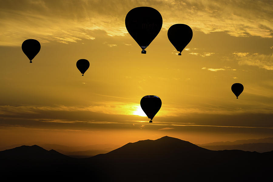 Hot Air Balloons At Sunrise Over The Atlas Mountains Photograph by Chris Lord