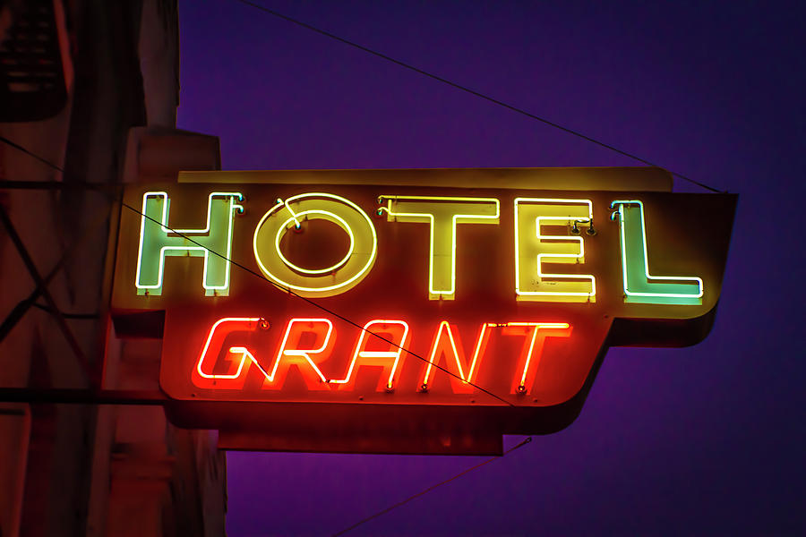 Hotel Grant Sign in Neon Photograph by Bonnie Follett
