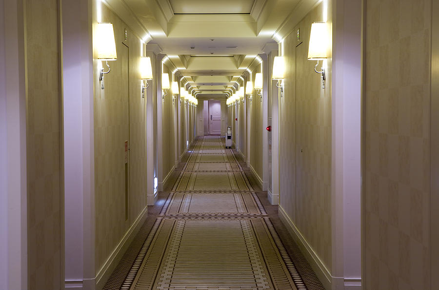 Hotel style, cream colored hallway with lamps Photograph by A330Pilot