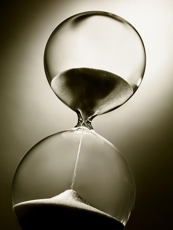 Hourglass, low angle, sepia tone Photograph by Burwellphotography