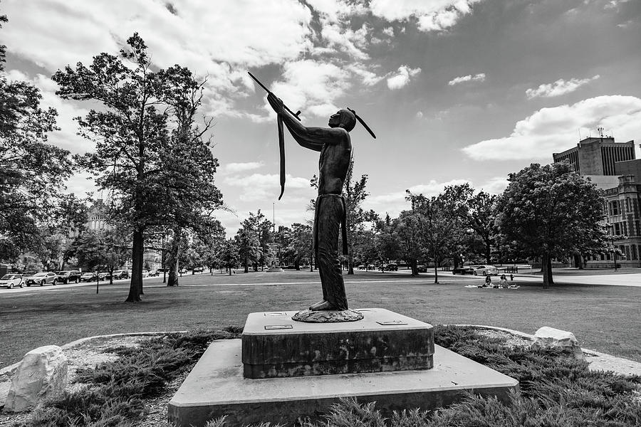 Houser Peace statue of Native American on the campus of the University of Oklahoma in BW Photograph by Eldon McGraw