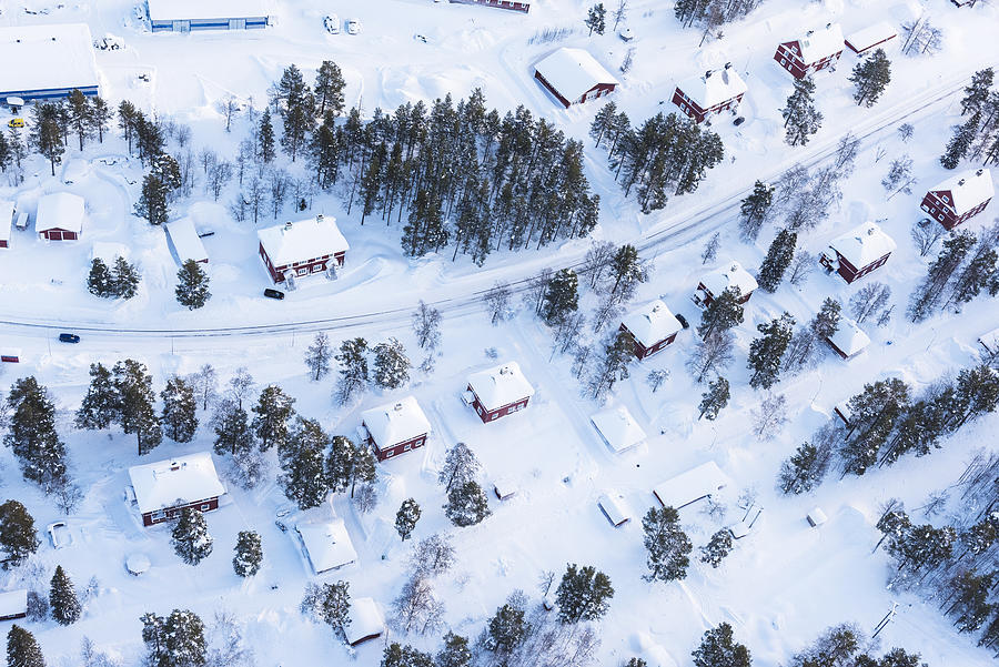 Houses at winter, aerial view Photograph by Johner Images