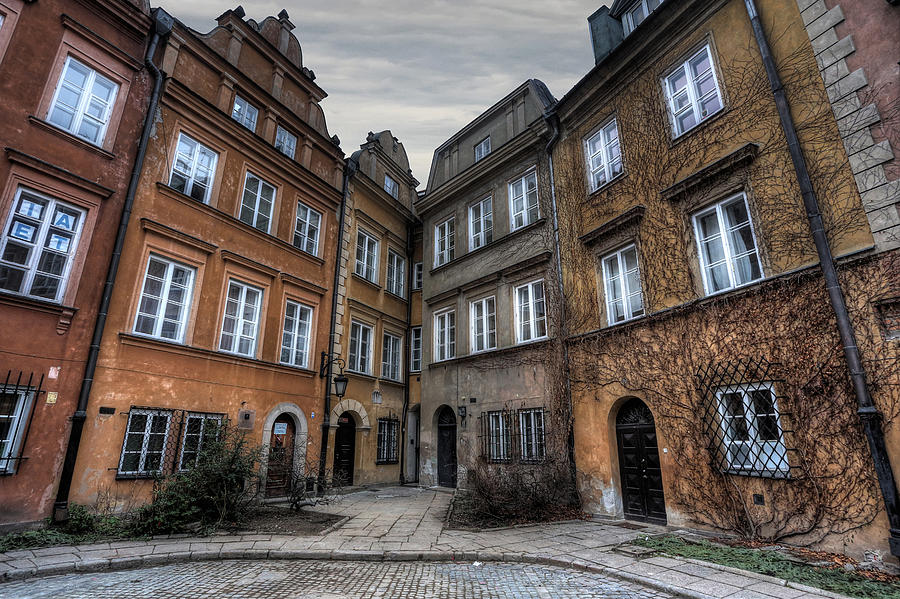 Houses in a alley in the old town of Warsaw Photograph by Davide Seddio