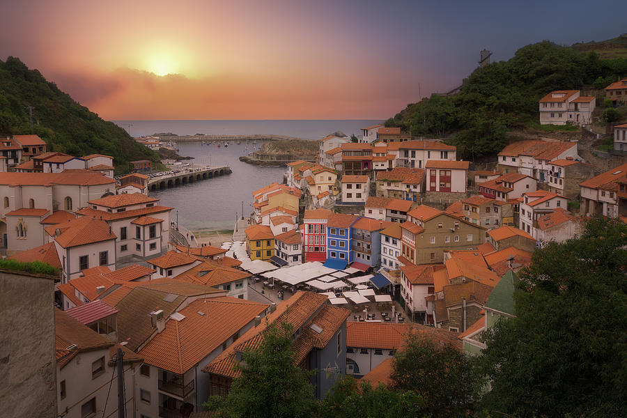 Houses in Cudillero port on cliff in Asturias Photograph by Mikel Martinez de Osaba