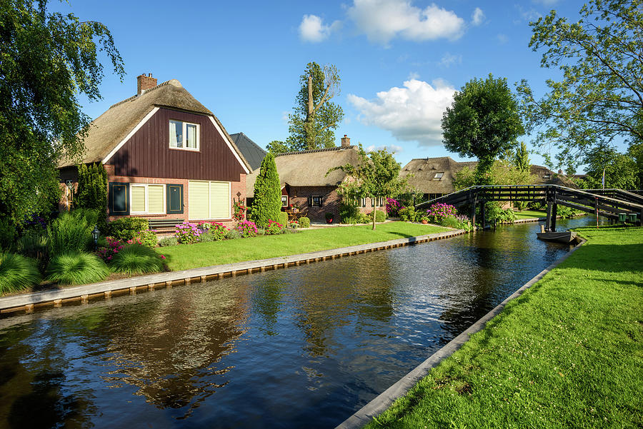 Houses on water canal in Giethoorn village, Netherlands Photograph by ...