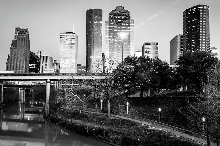 Houston Texas Skyline Over the Buffalo Bayou in Black and White Photograph by Gregory Ballos