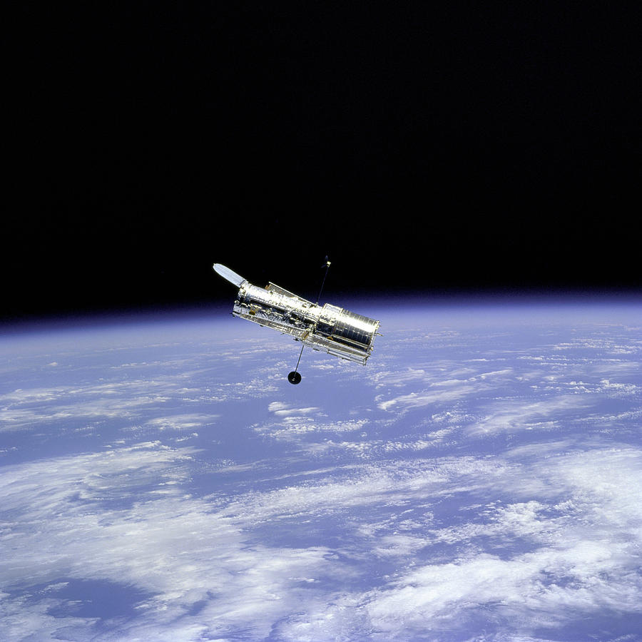 Space Photograph - Hubble Space Telescope and Earth Limb by Nasa