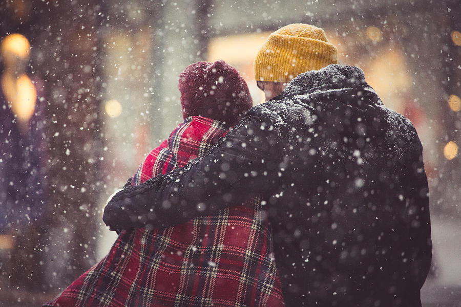 Hug in snowfall Photograph by Freemixer