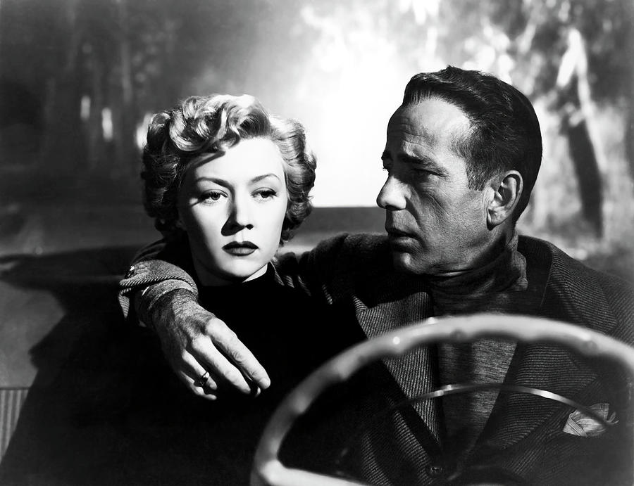 HUMPHREY BOGART and GLORIA GRAHAME in IN A LONELY PLACE -1950-, directed by NICHOLAS RAY. Photograph by Album