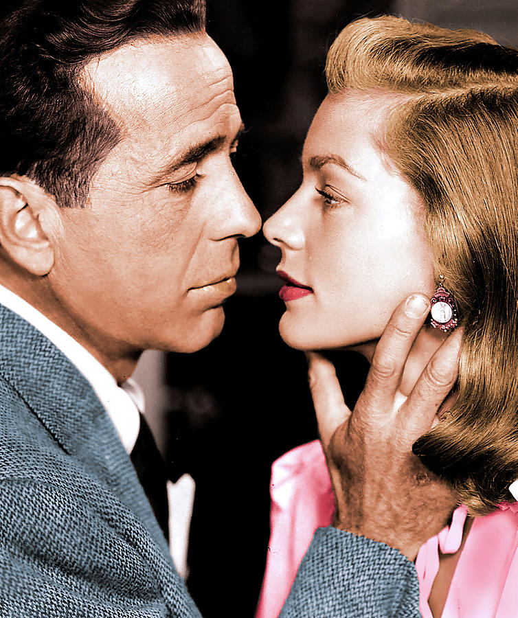 Humphrey Bogart Photograph - Humphrey Bogart and Lauren Bacall - still by Movie World Posters