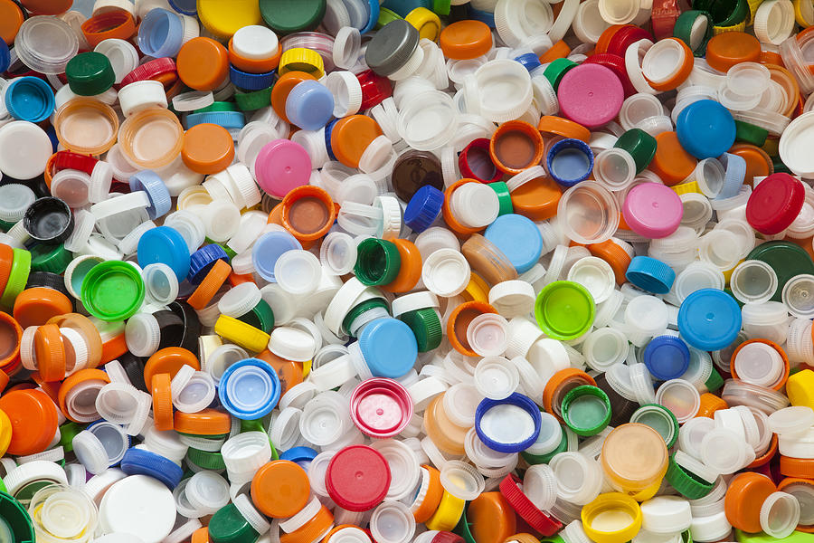 Hundreds of Colorful Plastic Bottle Caps Photograph by Deanna Kelly