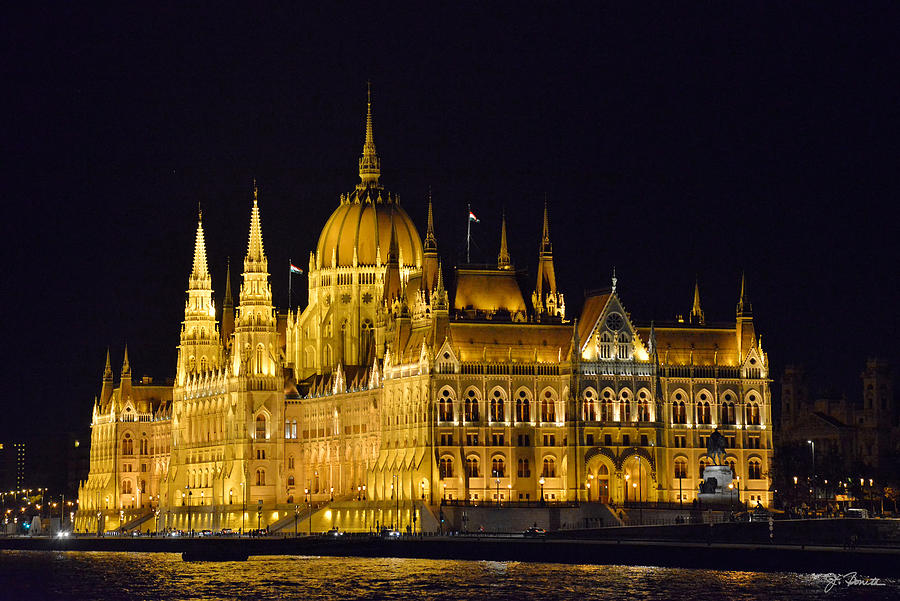 Hungarian Parliament Building on the Danube at Night Photograph by Joe Bonita