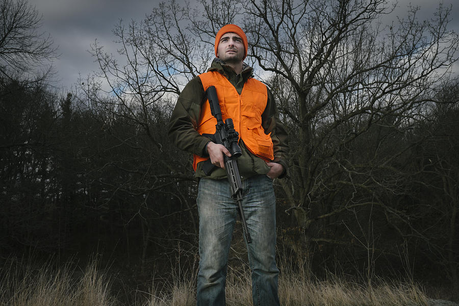 Hunter with a rifle Photograph by Andy445
