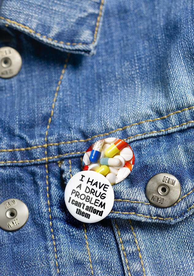 I have a drug problem button badge. Photograph by Peter Dazeley