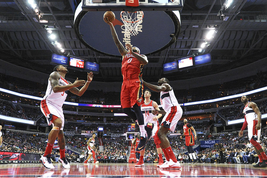 Ian Mahinmi, Demarcus Cousins, and Bradley Beal Photograph by Icon Sportswire