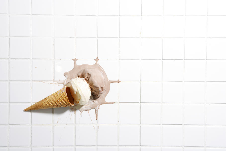 Ice cream and cone on tiled floor Photograph by Indeed