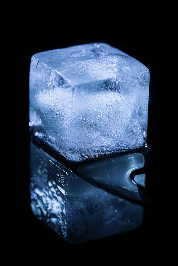 Ice cube Photograph by Tom Van den Bossche