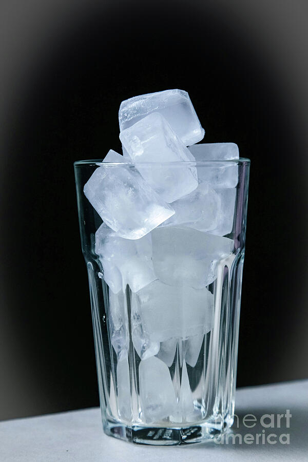 Ice Cubes in a glass Photograph by Nina Prommer