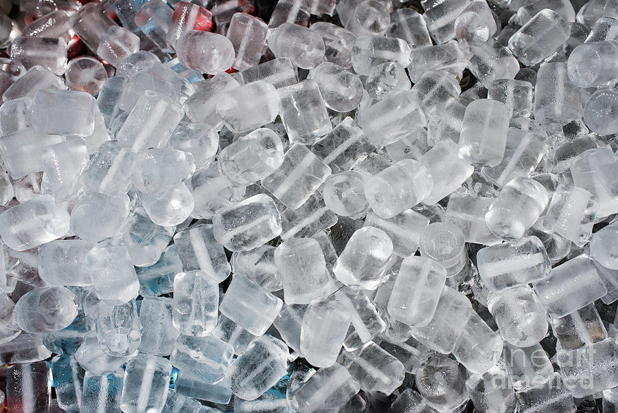 Ice cubes to cool drinks at a summer party. Photograph by Joaquin Corbalan