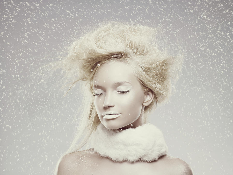 Ice maiden in snow Photograph by Image Source