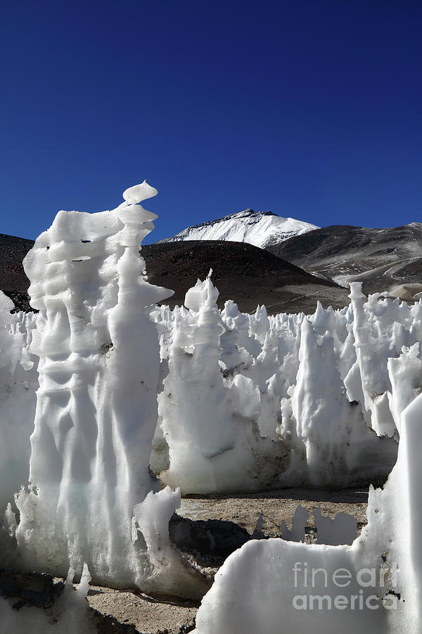 Ice sculptures and Ojos del Salado volcano Chile Photograph by James Brunker
