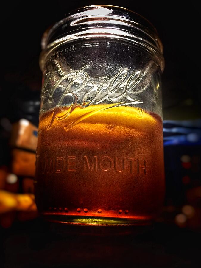 Ice tea with lemon in a Mason Jar Photograph by Shelli Fitzpatrick