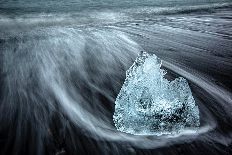 Iceberg at Jokulsarlon beach Photograph by Ruben Vicente