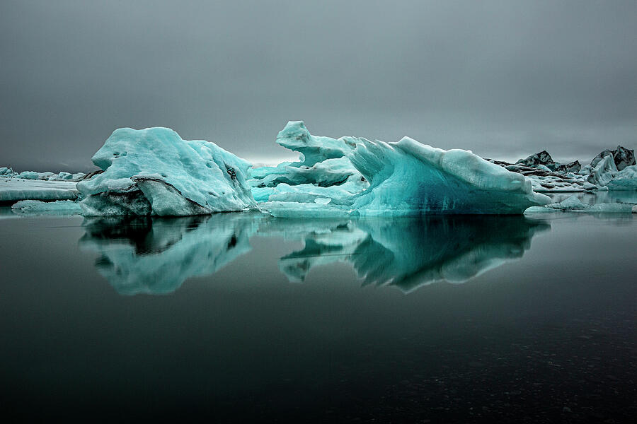 Iceberg at Jokulsarlon glacier lagoon Photograph by Ruben Vicente