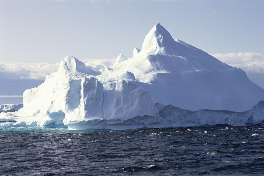 Iceberg in ocean , Antarctica Photograph by Comstock Images