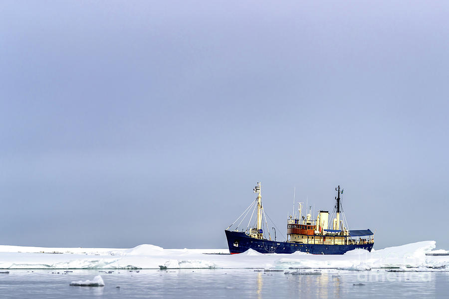 Icebreaker going through the pack ice of Svalbard Photograph by Jane Rix