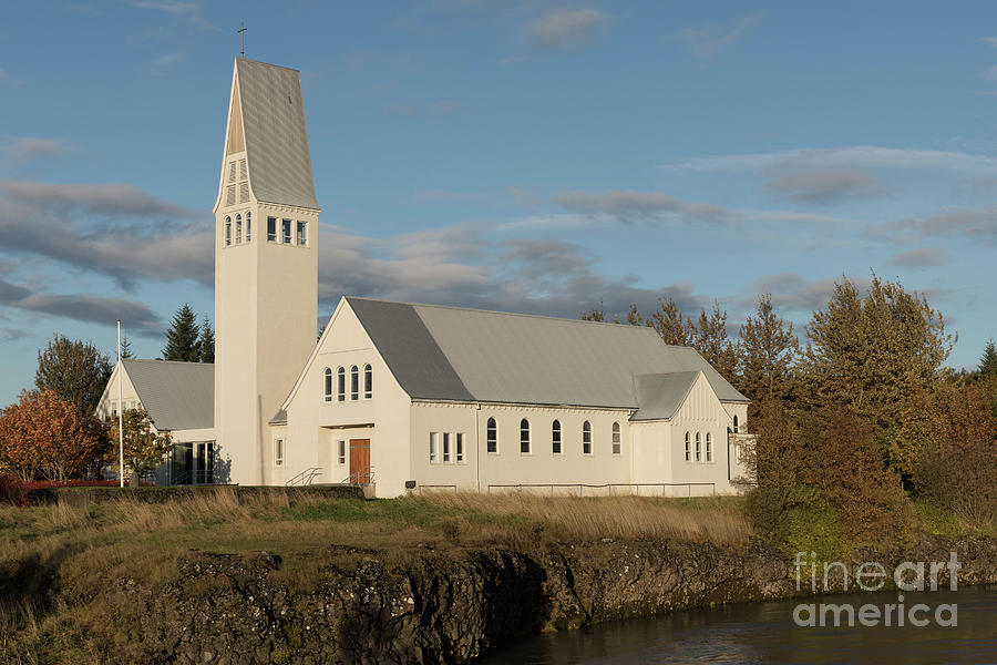 Iceland Church Beside The River Photograph by Daniel Ryan