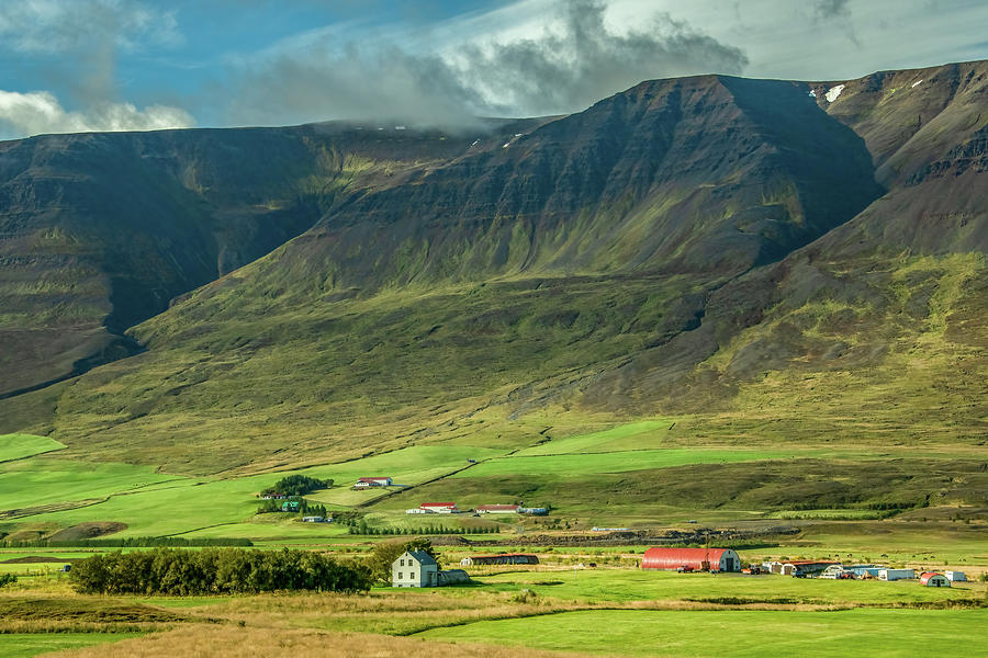 Icelandic Farm Snuggled Against the Mountain Photograph by Marcy Wielfaert