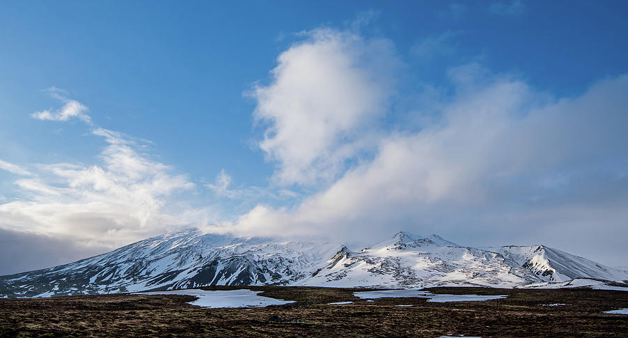 Icelandic landscape with mountains and meadow land covered in snow. Iceland Photograph by Michalakis Ppalis