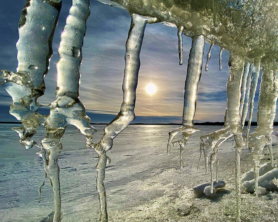 IcicleScape -  confused icicles clinging to an ice heave on frozen Lake Kegonsa Wisconsin Photograph by Peter Herman