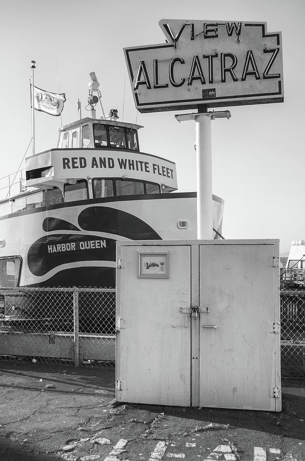 Iconic View Alcatraz Sign and Ferry Pier 33 Fishermans Wharf San Francisco Black and White Photograph by Shawn OBrien