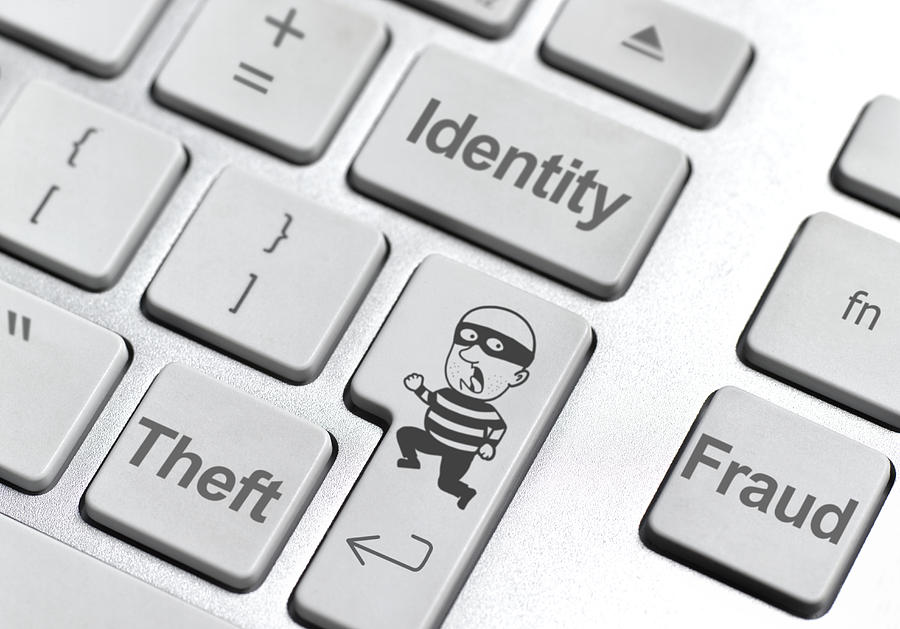 Identity theft keyboard Photograph by Peter Dazeley